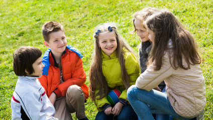 Happy kids chatting outdoor