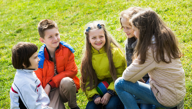 Happy kids chatting outdoor