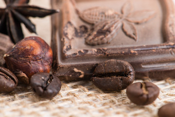 macro coffee beans, hazelnuts and old chocolate