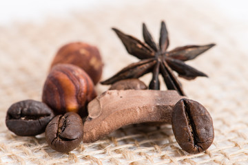 macro coffee beans, hazelnuts and old chocolate