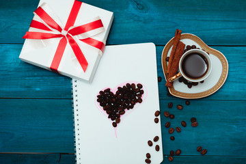morning coffee and heart in notepad