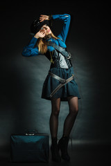 Steampunk girl with retro bag.