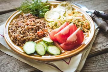 buckwheat garnish with salad and vegetables