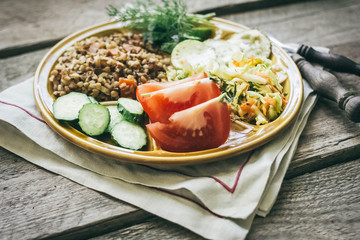 buckwheat garnish with salad and vegetables
