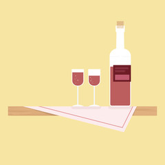 Wooden table with table cloth and wine