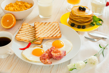 Covered table with breakfast
