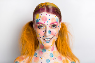 Very positive, bright, extraordinary picture. Candy Lady Art Makeup. Young smiling girl with...