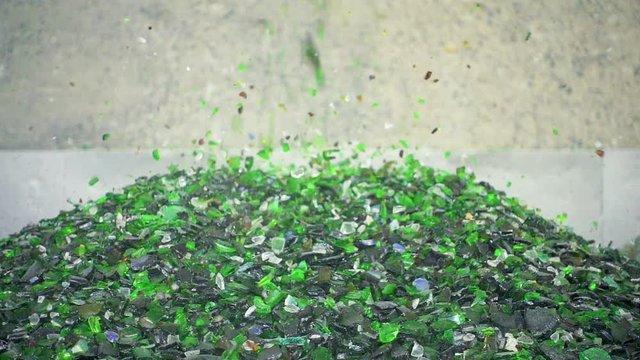 Sorting cullet. Glass recicling. Renewable production. Super slow motion