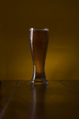 Beer glass on a wooden table