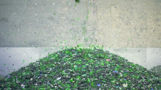 Sorting cullet. Glass recicling. Renewable production. Super slow motion