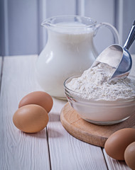 eggs flour scoop pitcher with milk