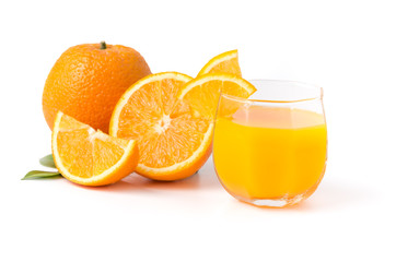 Glass of freshly pressed orange juice with sliced orange