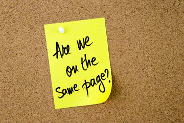 Are We On The Same Page ? written on yellow paper note