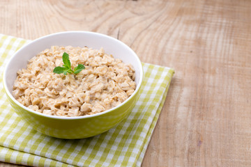 Oatmeal porridge with blueberries. healthy breakfast.