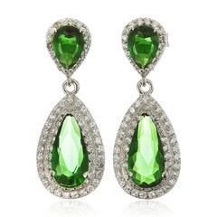 Silver earrings with emeralds isolated on white
