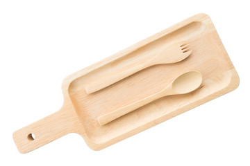 close up wooden dish ,spoon and fork on white background. top view