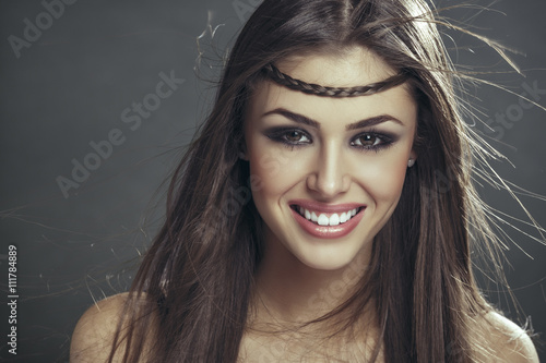 Portrait Of Beautiful Happy Smiling Woman With Braid On Her