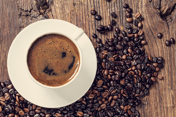 Cup of coffee on wooden table