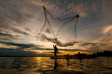 Fisherman in action when fishing