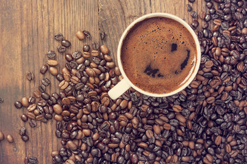 Cup of coffee on wooden table