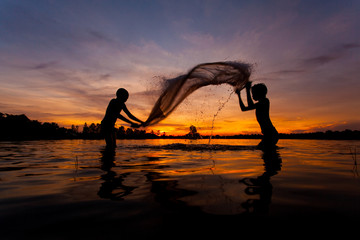 Fisherman in action when fishing