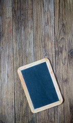 blackboard on antique wooden table