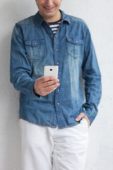 Young man using cell phone