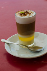 Barraquito – Traditional coffee in Tenerife ( Canary Islands), consisting of hot coffee, milk, milk condensed and liquor  with lemon and cinnamon