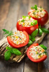 Zelfklevend Fotobehang Stuffed tomatoes with cheese and basil © pilipphoto