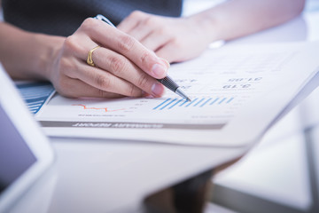 Image of business partners discussing documents and ideas at mee