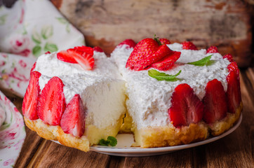 no baked Strawberry Cheesecake with cottage cheese on wooden background, selective focus.