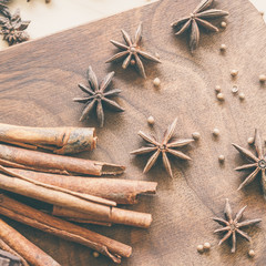 Spice anise, cacao and peper on wooden bacground.