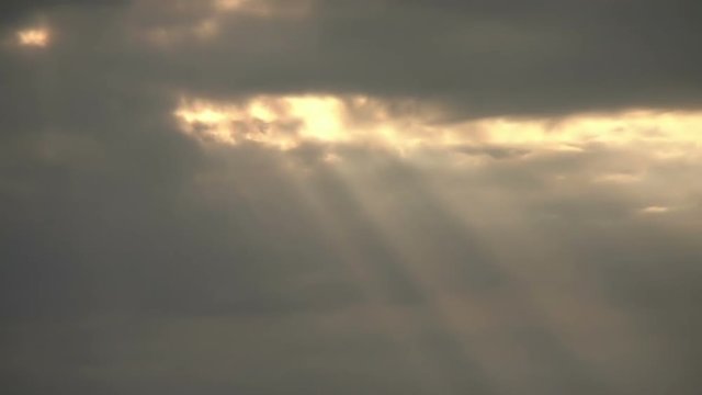 God like sun rays through a clouds time lapse

