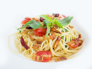Spicy spagetti with crispy pork Thai style food on white dish
