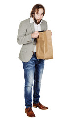 surprised business man with paper bag. human emotion expression