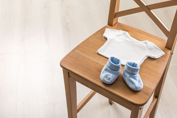 Fototapeta na wymiar Chair with baby items