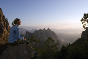 A woman on a mountain top on Corsica.