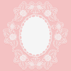 Lacy flower doily in the shape of the medallion. White lace cloth on a pink background.