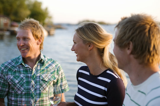 Three happy people, Fejan, Stockholm archipelago, Sweden.