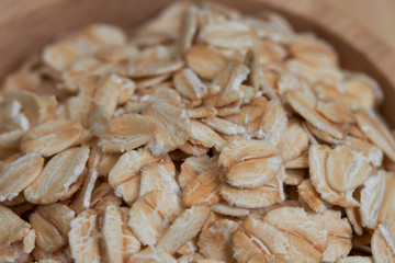 close-up rolled oats as background.