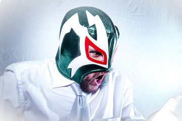Stress, angry businessman with Mexican wrestler mask, expression