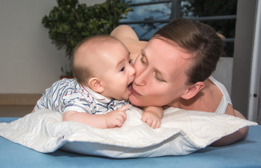 Portrait of happy mother and baby