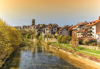 Fototapeta premium Cathedral of St. Nicholas and Sarine river in Fribourg, Switzerland