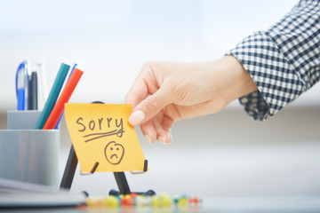 Sorry text on adhesive note