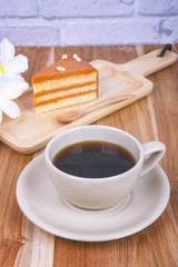  Americano coffee ,milk tea cake on plate wooden and Plumeria fl