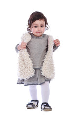Portrait of little girl in grey clothes on a white background