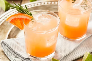 Fotobehang Refreshing Grapefruit and Tequila Palomas © Brent Hofacker