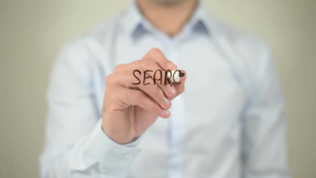 Search Algorithms , man writing on transparent screen