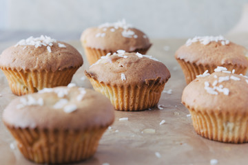Sweet homemade cupcakes with pineapple and coconut flakes