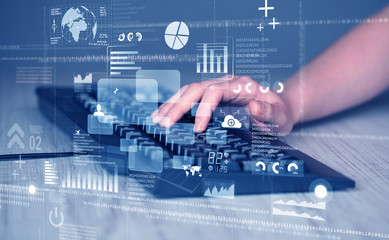 Keyboard buttons pressed by hand with high tech icons